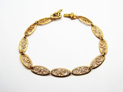 BRACELET en or jaune 18K (750/°°), maille...