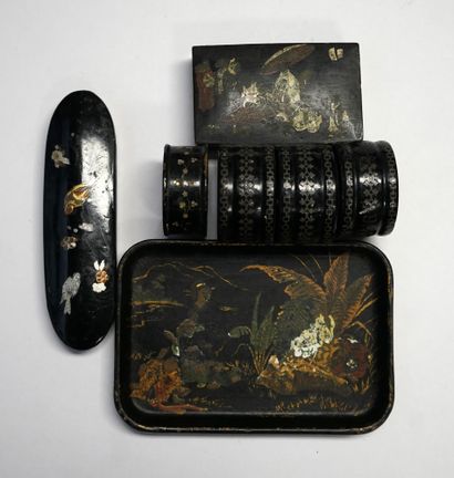 SET in black lacquered cardboard, with various...