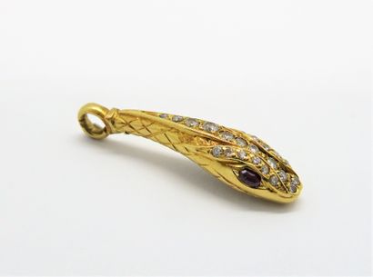 PENDENTIF en or jaune 18K (750/°°), figurant...