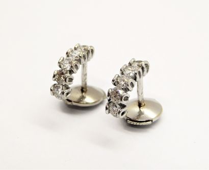 EARRINGS in 18K (750/°°) white gold, formed...