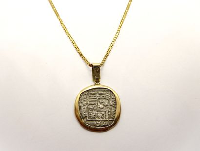 CHAIN AND PENDANT in 18K yellow gold (750/°°)...