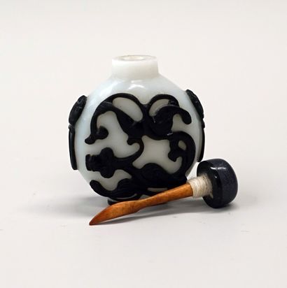 Round glass snuffbox with black overlay on...