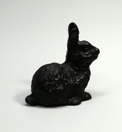 Small rabbit in bronze with brown patina....