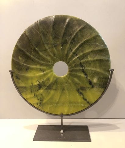 Chinese bi disc on black metal stand. A scholar's...