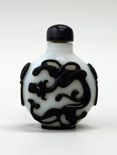 Round glass snuffbox with black overlay on...