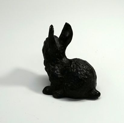 Small rabbit in bronze with brown patina....
