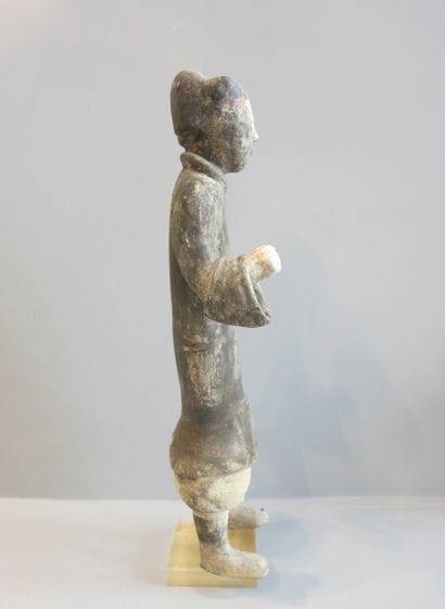 Lancer standing, right hand holding a spear...