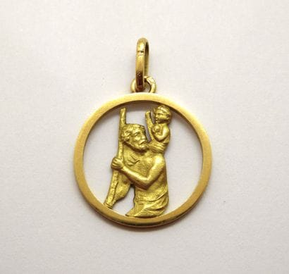 Religious medal in 18K yellow gold (750/°°)...