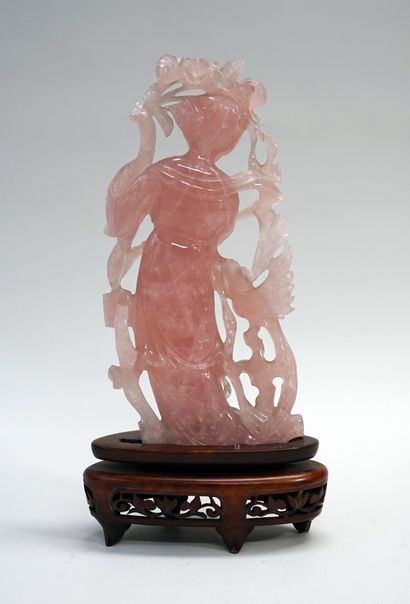 Rose quartz gwanyn holding a lantern and...