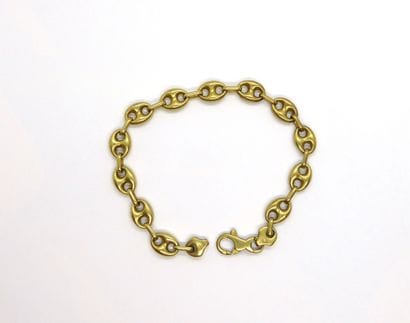 BRACELET in 18K (750/°°) yellow gold, coffee...