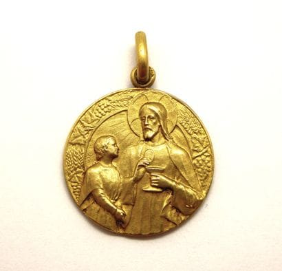 Religious medal in yellow gold 18K (750/°°)...