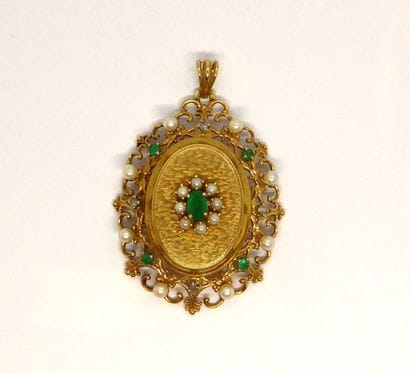 18K (750/°°) yellow gold pendant, set with...