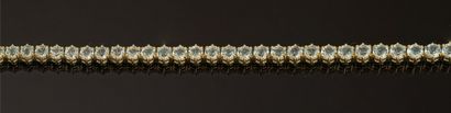 BRACELET LIGNE en argent doré (vermeil) serti...