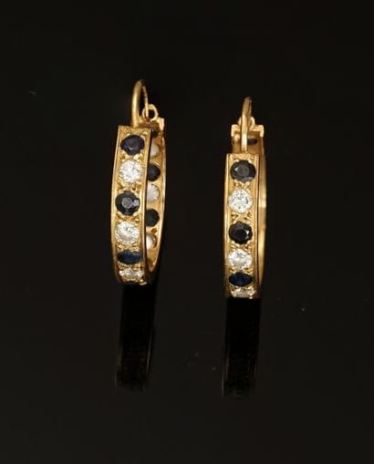 
PAIR OF CREOLES in 18ct yellow gold (750/°°)...