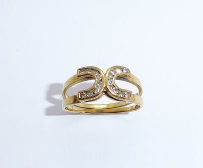 RING in 18K (750/°°) yellow gold featuring...