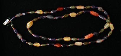 SAUTOIR composed of oblong beads of multicolored...
