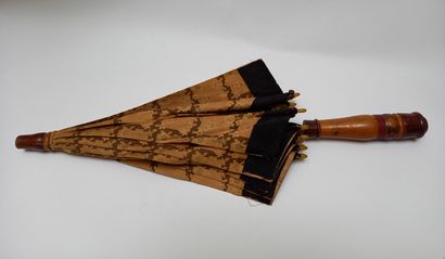 Small sunshade with turned wood handle and...