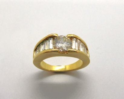 RING in 14K yellow gold (585/°°), set with...