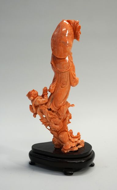 Gwanyn with a child in orange pink coral....