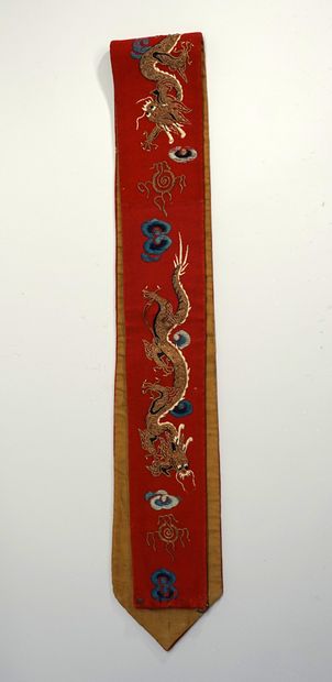 Vertical silk headband embroidered with golden...