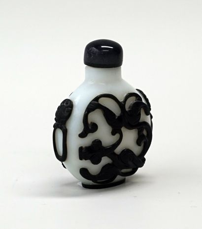 Round glass snuffbox with black overlay on...