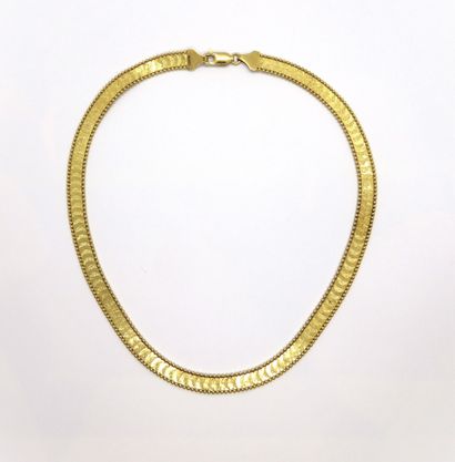NECKLACE in 18K (750/°°) yellow gold, reversible...