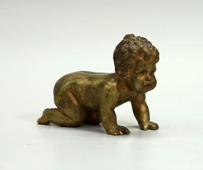 Gilded bronze ornament presenting a small...