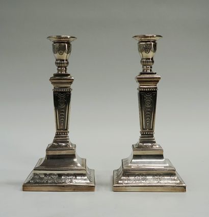 Pair of silver candlesticks min 800/°°, the...