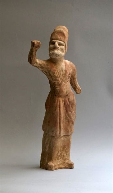 Beige terracotta shaman with white, red and...