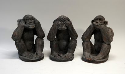 Wisdom monkeys in brown patinated terra cotta....