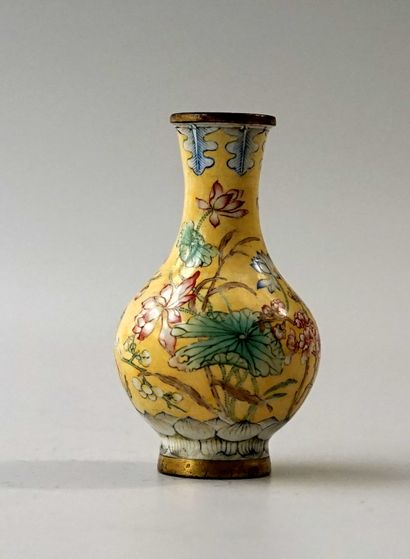 Small enamelled copper vase with floral decoration....