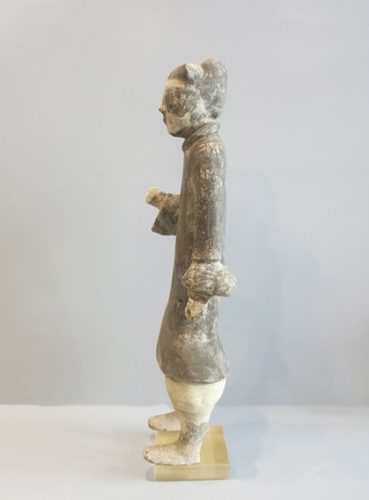 Lancer standing, right hand holding a spear...