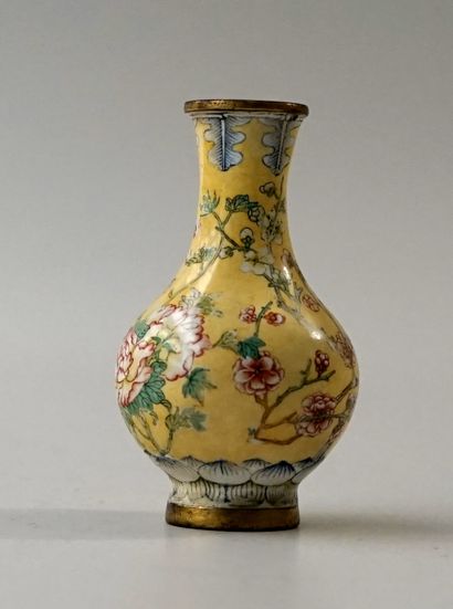 Small enamelled copper vase with floral decoration....