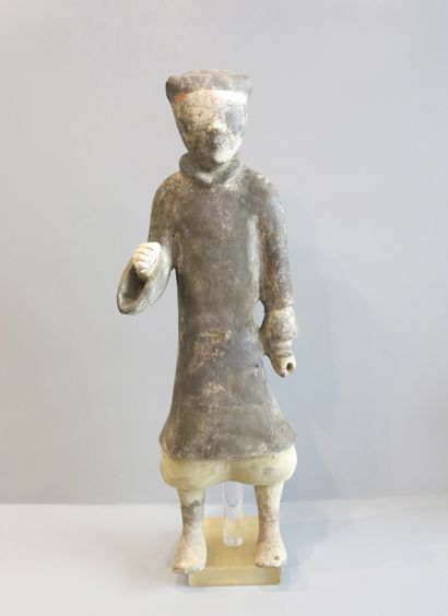 Lancer standing, right hand holding a spear...
