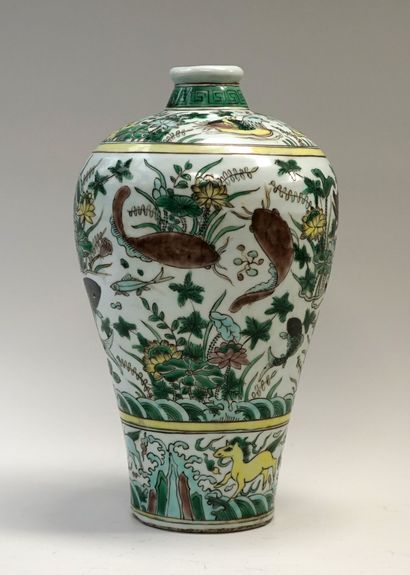 Porcelain vase with green, turquoise, yellow...