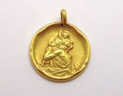 Religious medal in 18K (750/°°) yellow gold,...