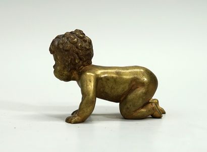 Gilded bronze ornament presenting a small...
