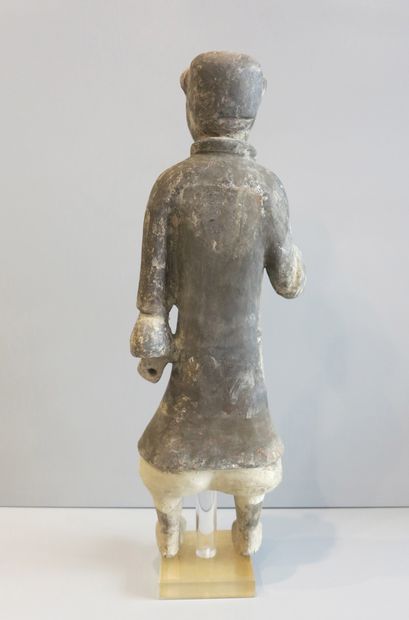 Lancer standing, right hand holding a spear...