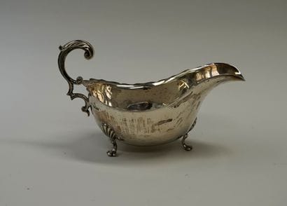 Sauceboat in silver min 800/°° (swan mark),...