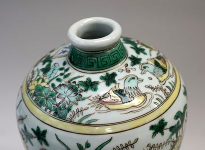 Porcelain vase with green, turquoise, yellow...
