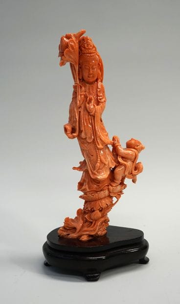 Gwanyn with a child in orange pink coral....