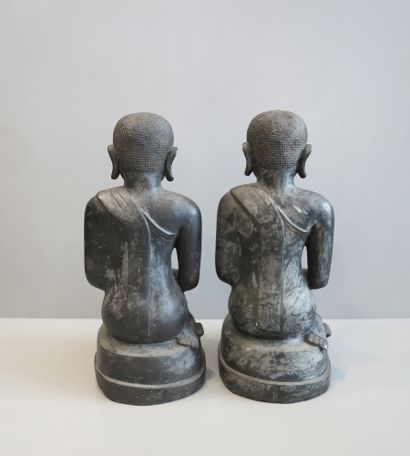 Pair of worshippers with half-closed eyes,...