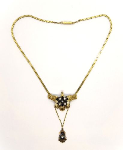 NECKLACE in 18K (750/°°) yellow gold, featuring...