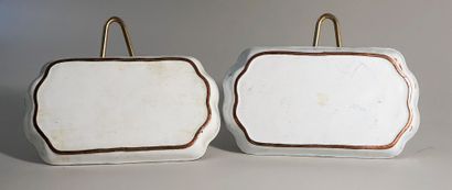 Two enamelled copper dishes decorated with...