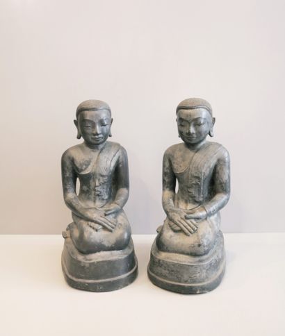 Pair of worshippers with half-closed eyes,...