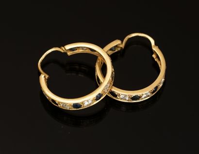 
PAIR OF CREOLES in 18ct yellow gold (750/°°)...