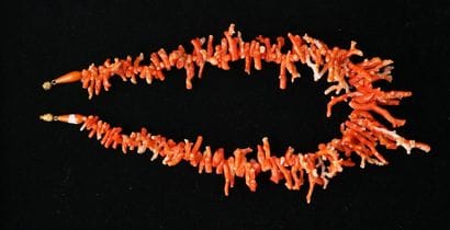 NECKLACE composed of large branches of orange...