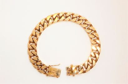 BRACELET in 18K (750/°°) yellow gold, massive,...