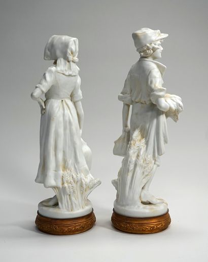 COUPLE of young peasants in white cookie...