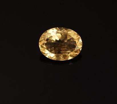 CITRINE facettée ovale sur papier. 12.90ct....